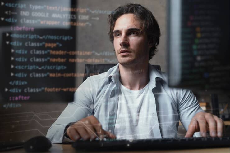 Coding Collage with Man Sitting Near the Monitor